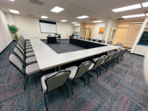UVCC Conference Room with U-shaped table and chairs setup